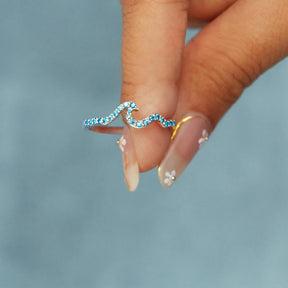 LIFE IS LIKE THE OCEAN PAVÉ WAVE RING