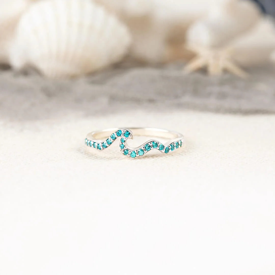 LIFE IS LIKE THE OCEAN PAVÉ WAVE RING