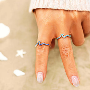 LIFE IS LIKE THE OCEAN PAVÉ WAVE RING